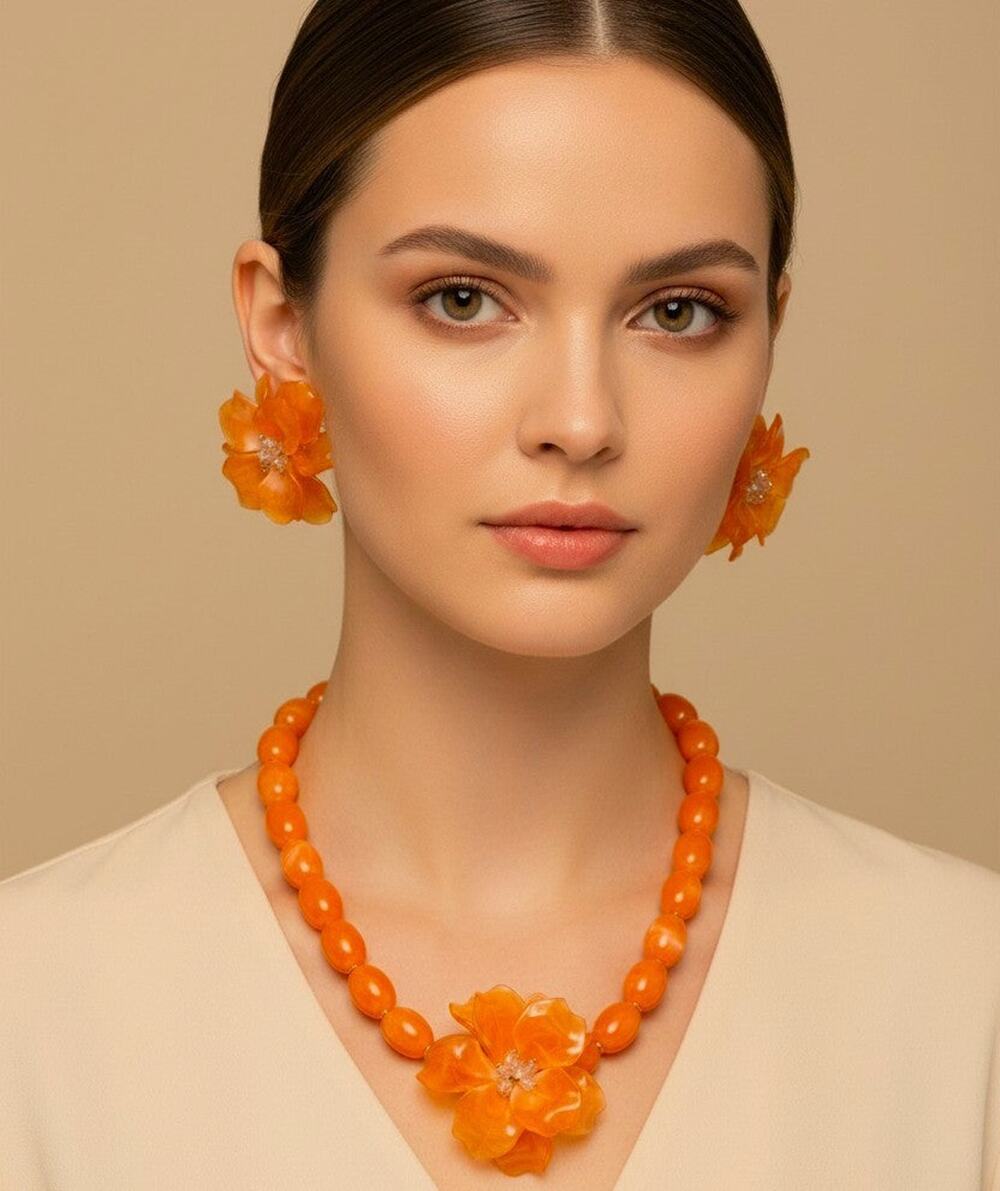 Beautiful pierced gold and orange plastic necklace and large earring set